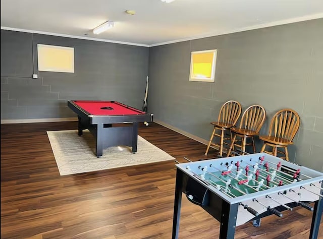 game room with baseboards, wood finished floors, billiards, and crown molding