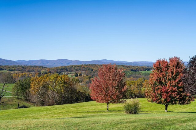 view of mountain feature with a rural view