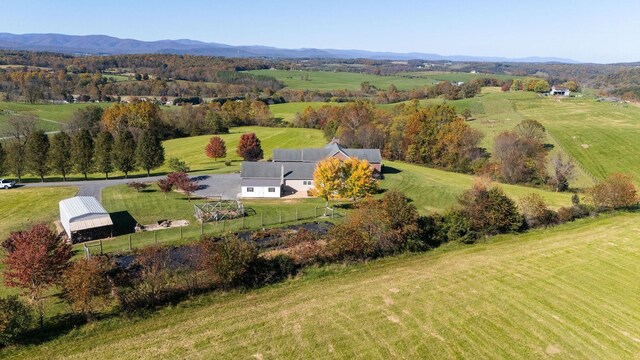 aerial view with a mountain view and a rural view