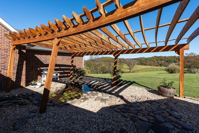 view of patio / terrace featuring a pergola