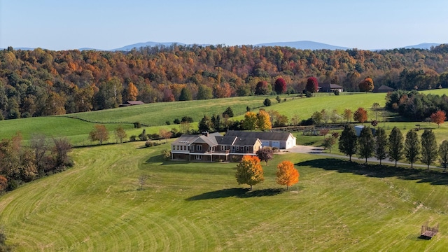 bird's eye view with a rural view and a mountain view