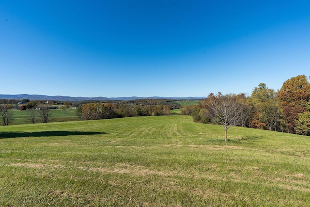 property view of mountains with a rural view