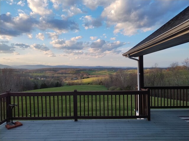 deck featuring a yard