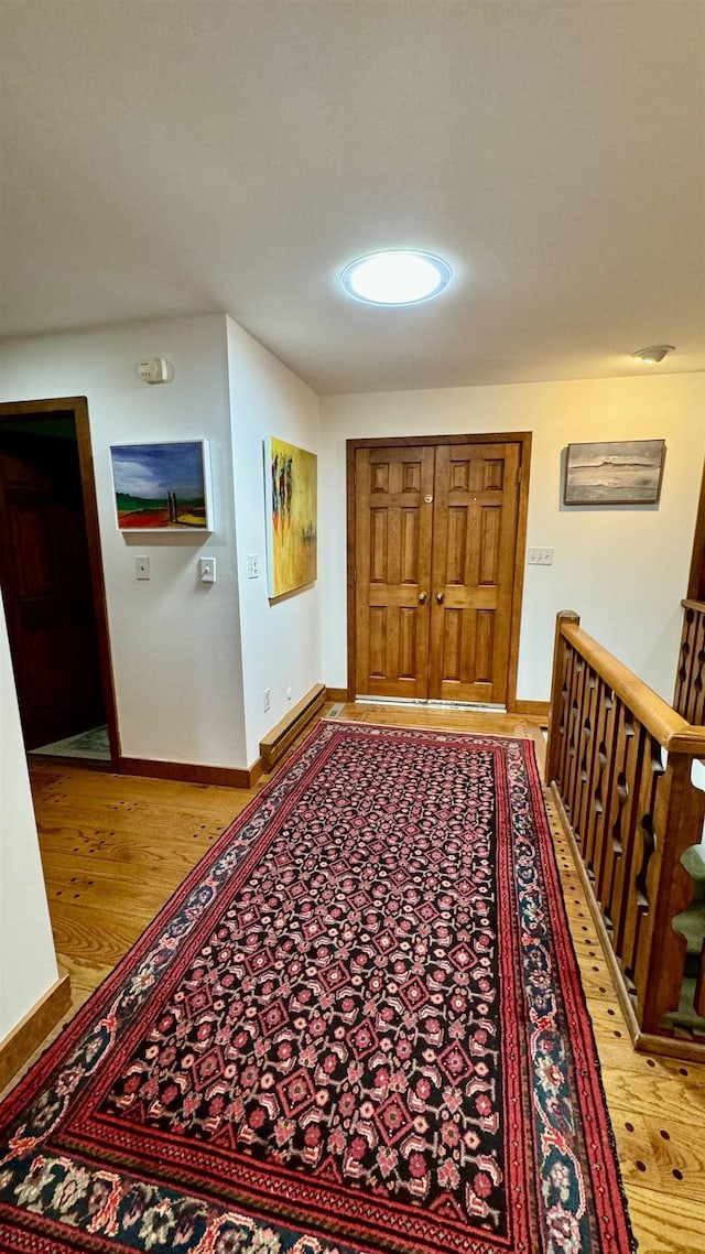 hall featuring light hardwood / wood-style flooring