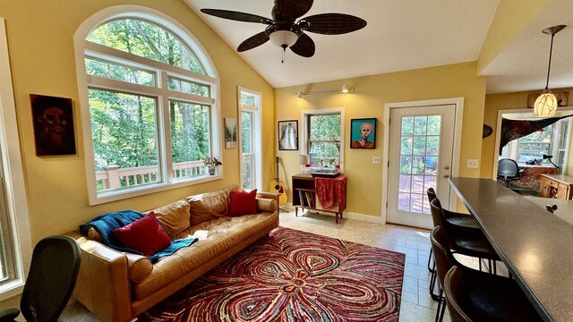 living room featuring lofted ceiling and ceiling fan