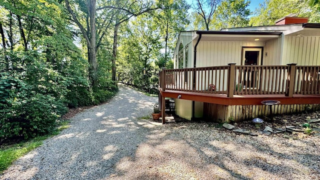 view of home's exterior featuring a deck