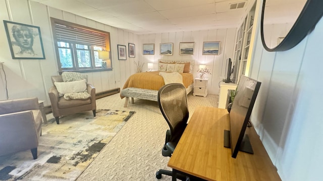 bedroom with light colored carpet