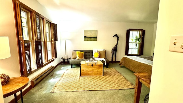 bedroom featuring a baseboard radiator and carpet