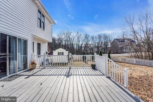 wooden terrace with a storage unit