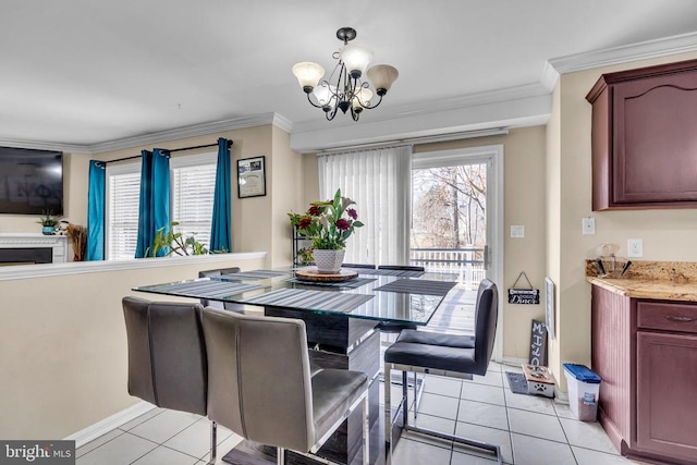 tiled dining room featuring crown molding and a notable chandelier