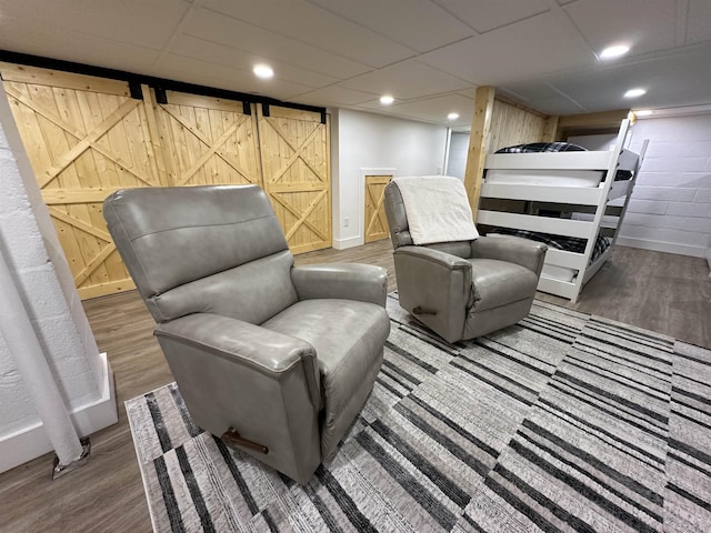 interior space with recessed lighting, baseboards, and wood finished floors