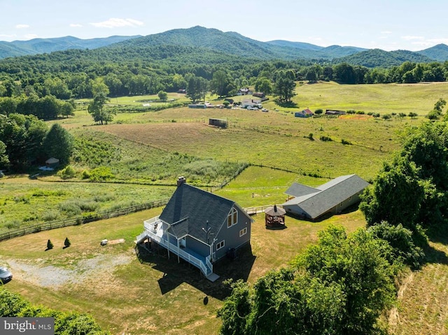 bird's eye view with a mountain view and a rural view