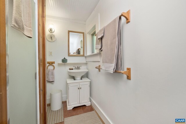 bathroom with vanity and tile patterned floors