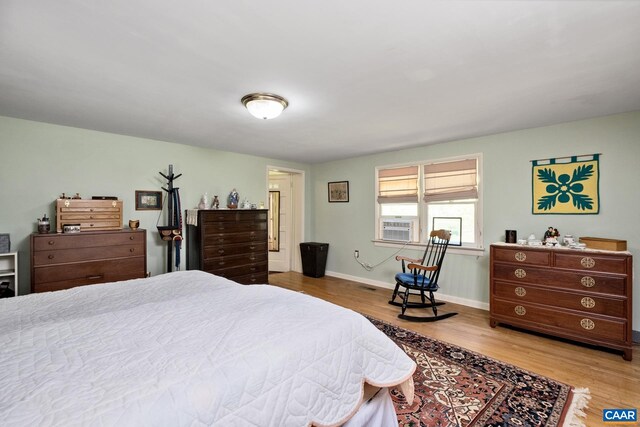 bedroom featuring light hardwood / wood-style floors