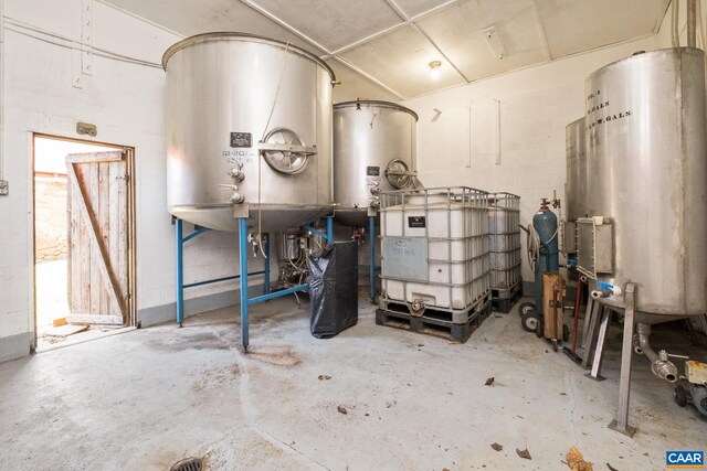 utility room with water heater