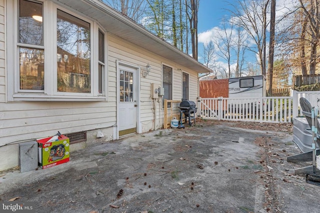 view of patio / terrace featuring fence