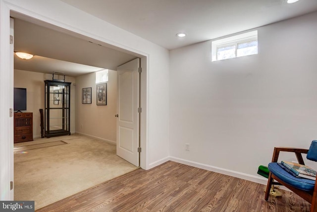 unfurnished room with recessed lighting, baseboards, and wood finished floors