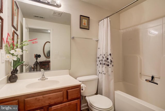 full bath with visible vents, toilet, shower / bath combo, and vanity