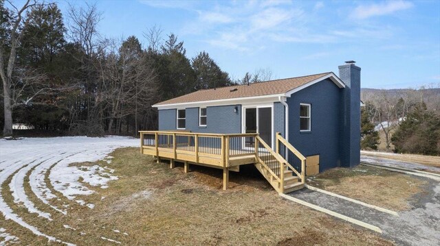 view of front facade featuring a wooden deck