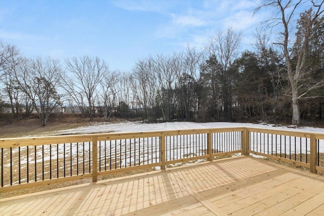 view of snow covered deck