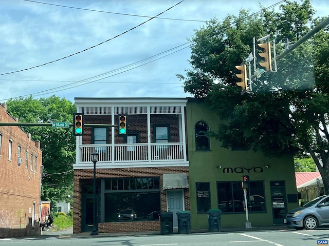 view of front of house with brick siding