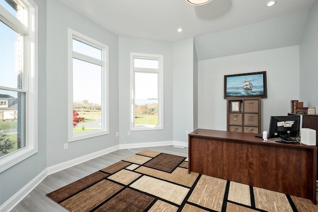 office space with light hardwood / wood-style floors