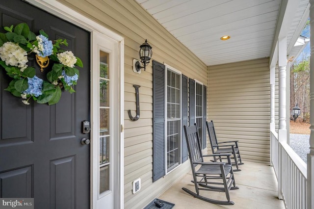 entrance to property with a porch