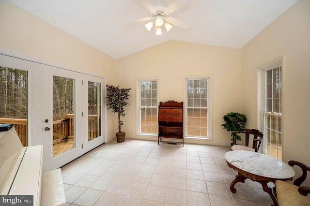 sunroom featuring french doors