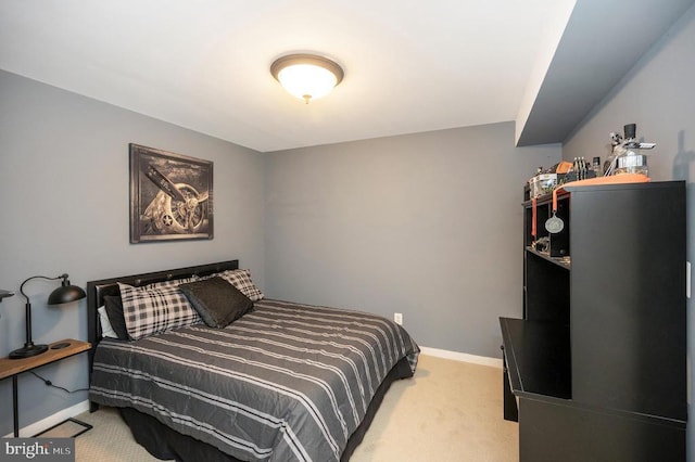 carpeted bedroom with baseboards