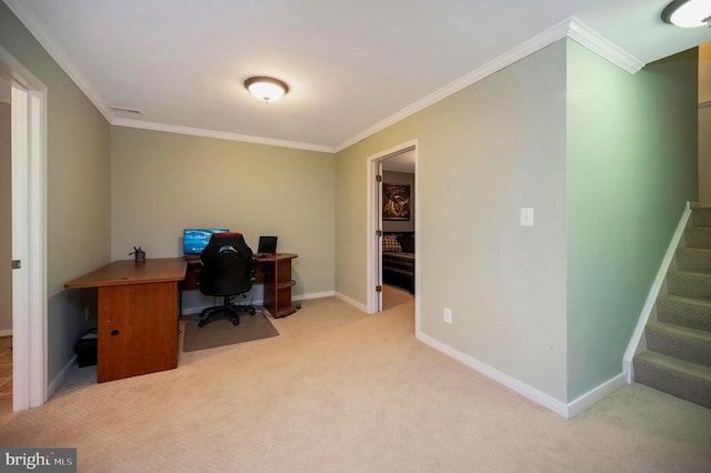 carpeted office featuring baseboards and crown molding