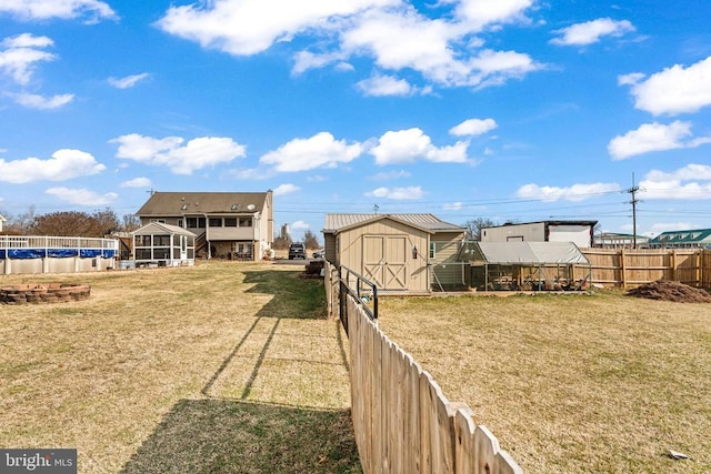 view of yard with a storage shed