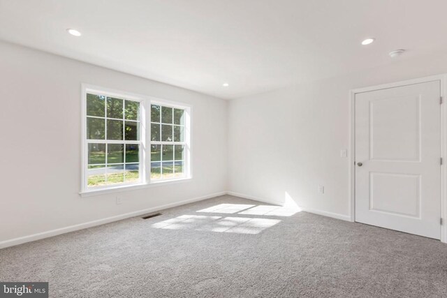 view of carpeted spare room