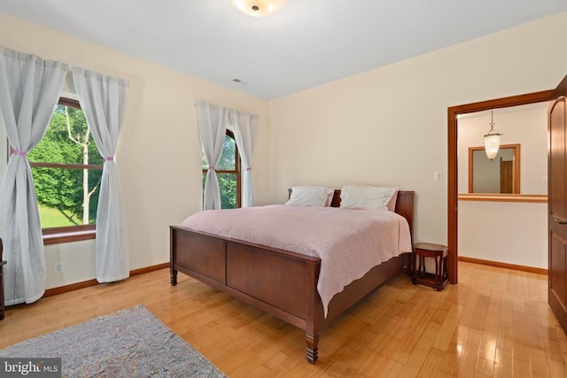 bedroom featuring light hardwood / wood-style flooring