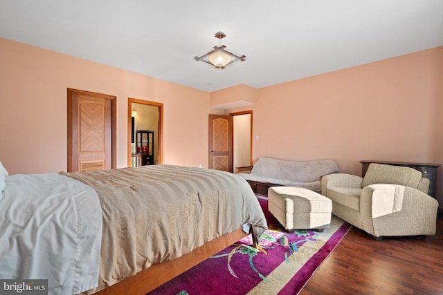 bedroom featuring dark wood-type flooring