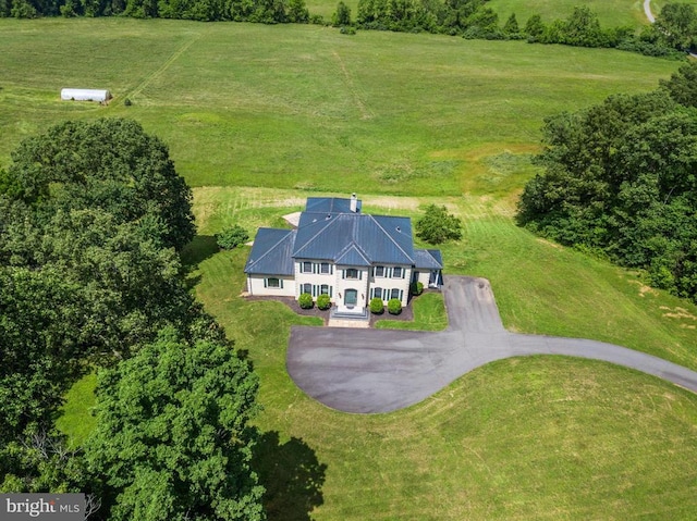 birds eye view of property featuring a rural view