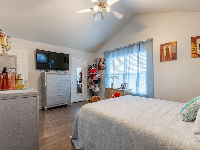 bedroom featuring ceiling fan, lofted ceiling, and dark hardwood / wood-style floors