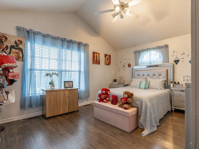 bedroom featuring dark wood-type flooring, ceiling fan, and lofted ceiling