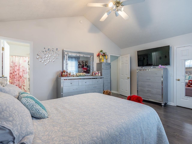 bedroom featuring dark wood-type flooring, ceiling fan, and lofted ceiling