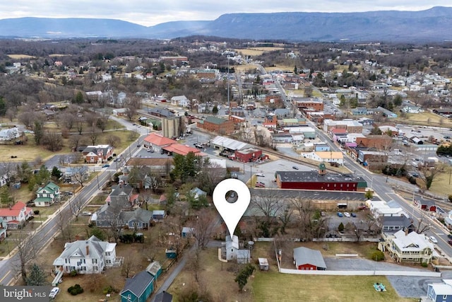 drone / aerial view featuring a mountain view