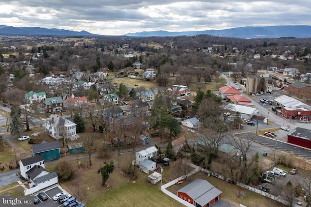 drone / aerial view featuring a mountain view