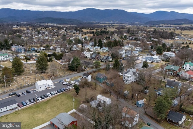 drone / aerial view featuring a mountain view