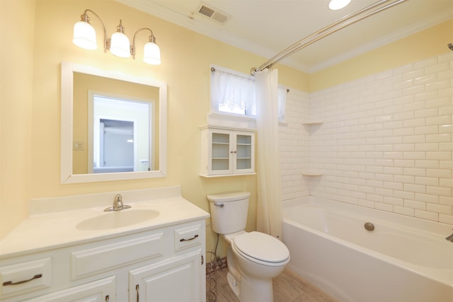 full bath featuring visible vents, toilet, shower / bath combo with shower curtain, crown molding, and vanity