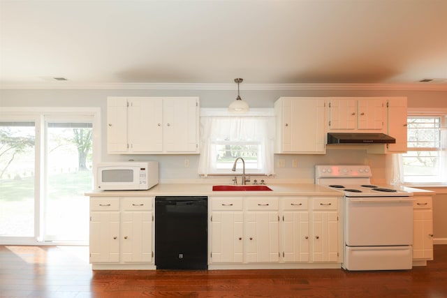 kitchen with plenty of natural light, white appliances, a sink, and under cabinet range hood