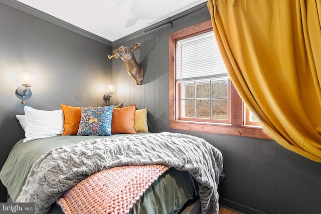 bedroom featuring crown molding