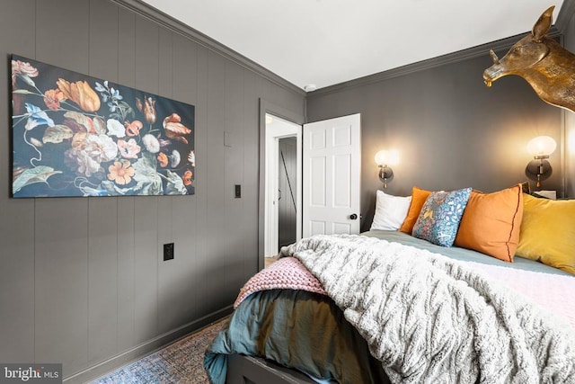 bedroom with ornamental molding