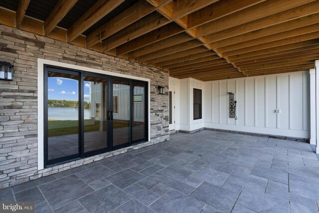 view of patio / terrace featuring a water view