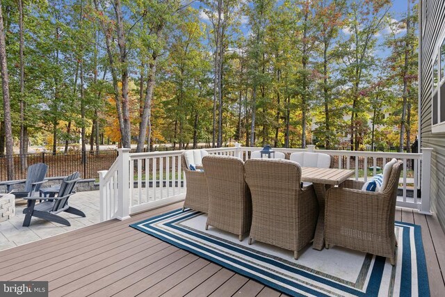 deck with outdoor dining space