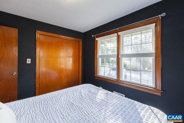 unfurnished bedroom featuring a closet