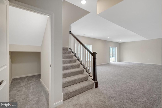 stairs with recessed lighting, carpet flooring, and baseboards