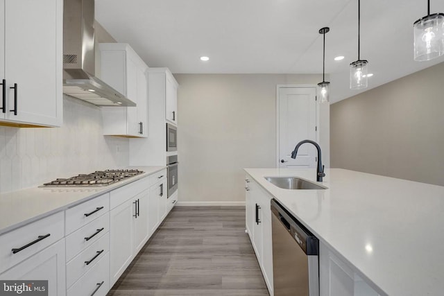 bathroom featuring hardwood / wood-style flooring, vanity, and a healthy amount of sunlight